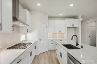 Photos are a completed home of the same floorplan.