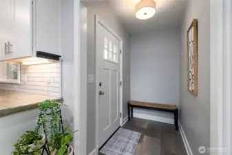 Welcome home!  Nice foyer area with room for shoes and coat hooks.