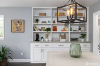 Custom built-ins evoke the charm of the original 1940s home, but offer the style and efficiency of modern cabinetry including soft-close doors and drawers, and power outlets conveniently located for lighting or charging your electronics.