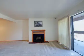 Living room with sliding doors to the balcony.