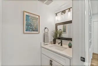 A stylish main-floor powder room for guests