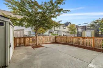 Fenced patio for BBQs, playtime, or twinkling lights