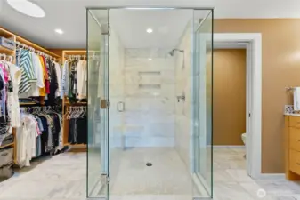 Primary bedroom attached walk-in closet and 3/4 bathroom
