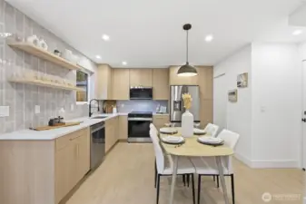 Bright kitchen with quartz countertops.