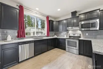 So much counter and cabinet space! Stainless appliances