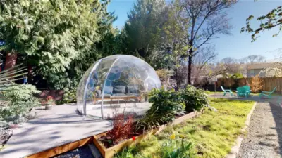 Come hangout in the garden dome with a view of the yard and weather while you're protected inside.