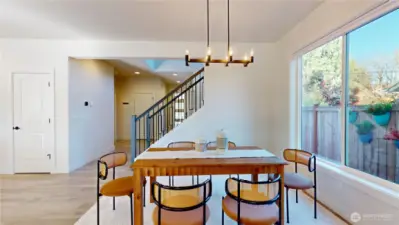 Great room - Formal dining space across from kitchen.  The door on the left is the pantry.