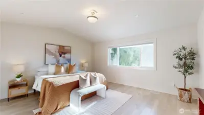 Upstairs - Primary Suite shown with king-size bed. Plenty of space and view of yard. Image 1 of 2.