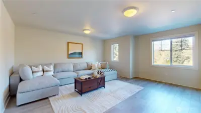 Upstairs - Bedroom 5. Shown as media room / playroom. Image 1 of 2.