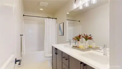 Upstairs - Full bath with double vanity.