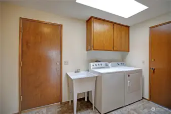 Large mud/utility room right off the kitchen.