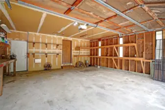 Spacious two car garage with access to backyard.