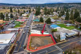 Prime corner lot on Tolt Ave/Hwy 203 and Entwistle St.; two high visibility, pedestrian and vehicle traffic flow streets