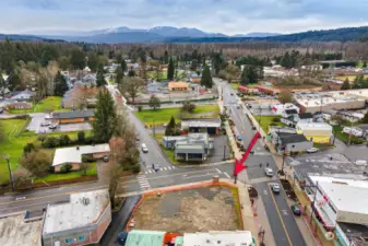 Looking south from downtown Carnation; 43 new construction homes being built 2 blocks south. Perfect confluence of business, residential & high visibility/access location.