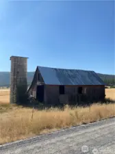 A neighbor’s barn on Mcalister Road on one of the two ways to come and go.