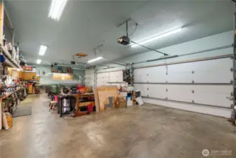 1250 Square foot garage, heated, pit for oil changes, etc. lots of electrical outlets, work benches thru out the structure.