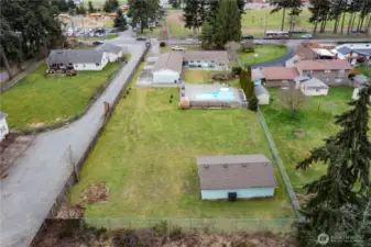 New roof installed on all the structures in 2017. Yard is fully fenced. Blackberry bushes running along fence next to pool.
