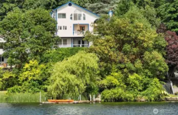 Live Large in this 4,208-sf lake home
