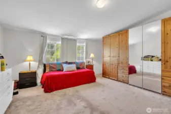 Primary bedroom with beautiful built in wardrobe.