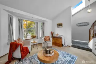 High ceilings, bay window & skylight for natural lighting.