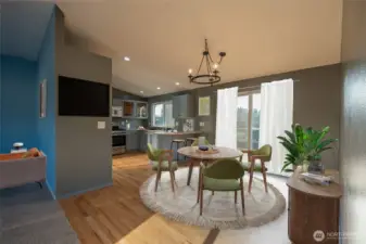 This space naturally flows into the dining and kitchen areas, making it ideal for entertaining or everyday living.