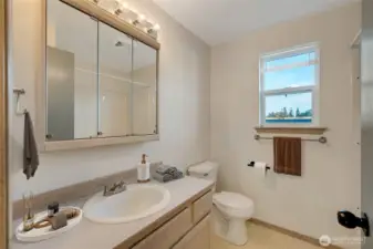 They share a full bath, thoughtfully designed to combine style and functionality.