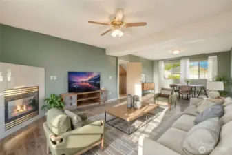 Downstairs features a large family or rec room, ideal for movie nights, game days, or a flexible space for hobbies and gatherings.
