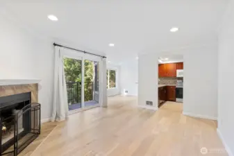 The living, dining, and kitchen areas work seamlessly together whether you're hosting or just enjoying a night at home.