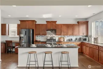 You’ll love the abundant counter space and cabinetry, perfect for everyday cooking or entertaining.
