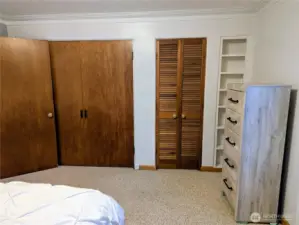 So much storage - adorable built-ins as well.