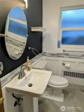 Nes sink, new mirror, new title, freshly painted...