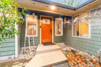 Entrance with solid wood door.