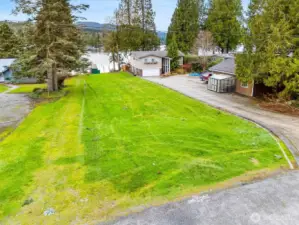 Beautiful grass area to relax by the lake.