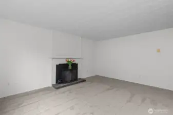 Can you imagine how cozy this wood-burning insert makes the Living Room on chilly nights?