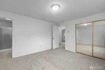 Mirrored closet doors and that 3/4 bath make this space perfect!  You do not have to leave your space until you are completely ready to!