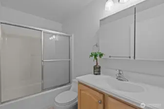 Beautiful Full Bath with glass doors.