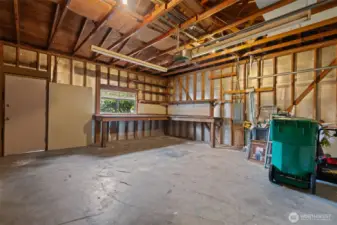 Garage with built-in Workbench that stays.