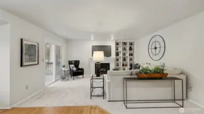 The family room is well sized with a wood burning fireplace.  Built-in shelves and sliding glass doors to medium sized deck for those morning coffees or evening meals.