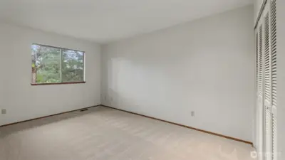 One of the 3 additional bedrooms.