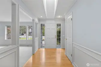 Gracious and light-filled entry into this Possession Bay Rambler.