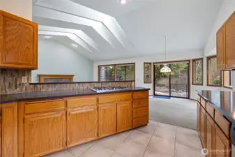 This home has a floor plan that lends itself to entertaining and space for all. Informal dining with slider to private back yard area on greenspace.