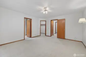 Spacious primary bedroom has 5 piece ensuite and large walk - in closet.