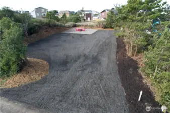 With greenery left on the sides and a greenbelt to the rear, the lot feels very private.