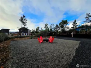 This area is perfect for the fire pit, picnic table, or other recreational items you add to the land.