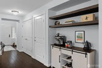 Pantry and open shelves with buffet.