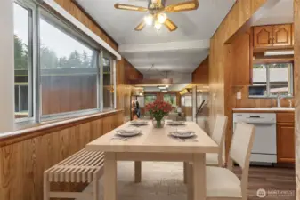 Dining room just off kitchen. Virtually Staged.