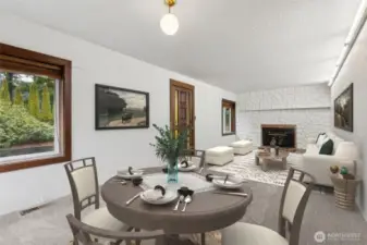 Living Room shot from the opposite angle w/ shot of breakfast nook virtually staged.