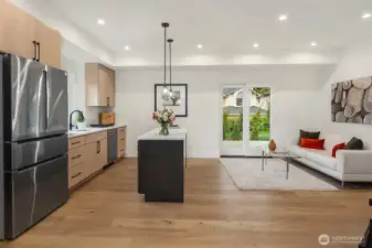 Lower-level Mother-in-law unit offers a completely separate living space with private entry and patio access