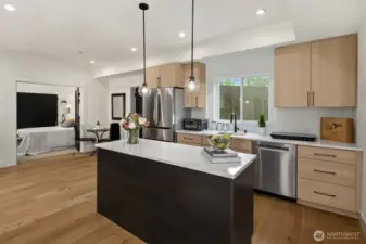 Spacious kitchen with full size refrigerator and dishwasher