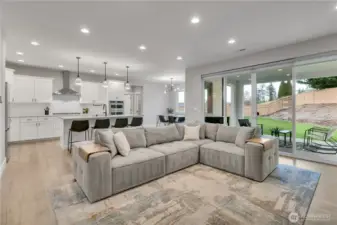 Large open family room and kitchen and opens to the covered patio.